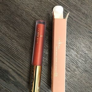- Mellow lip Gloss.  NWT